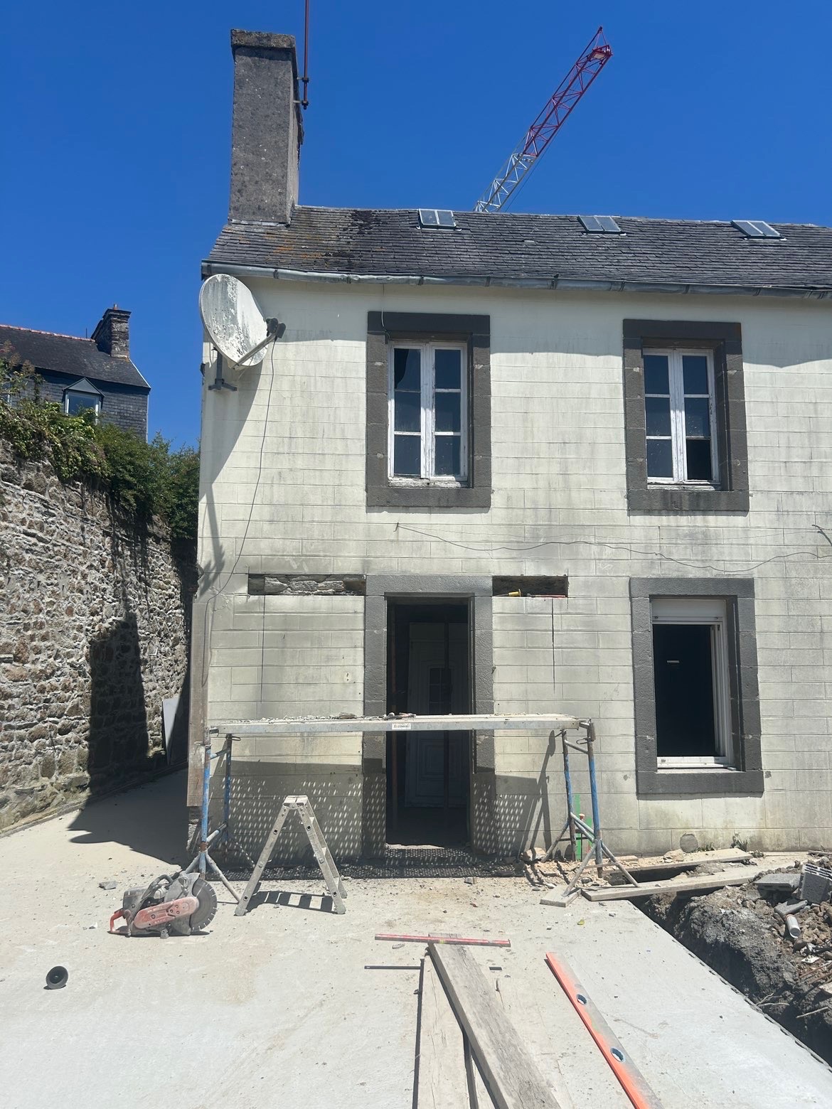 Réhabilitation façade pierre — RIO Construction